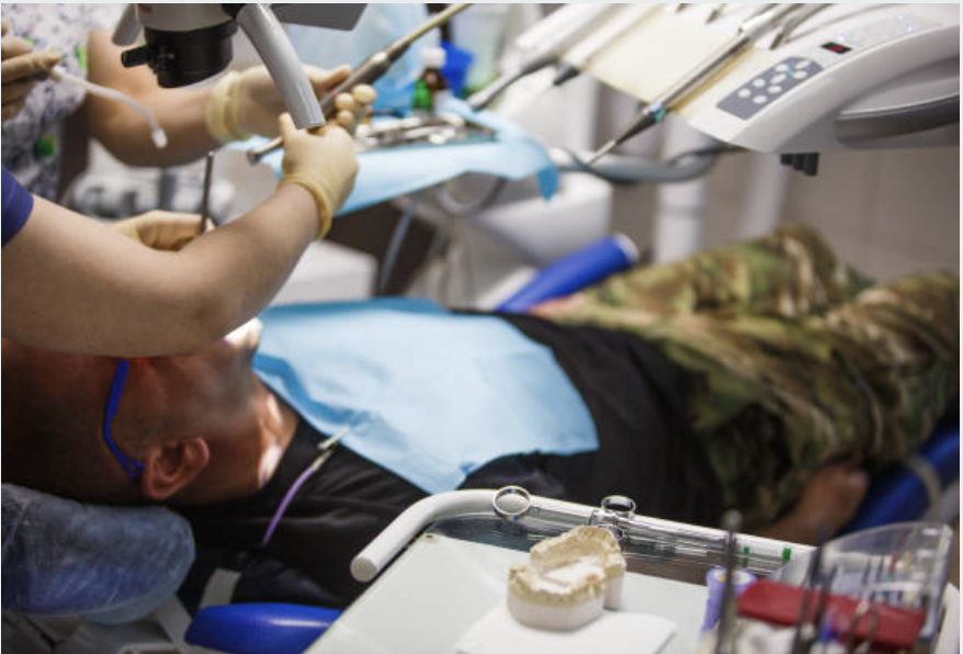 Dynamic cover of Veteran Health compendium with stock photos of veterans and clinicians